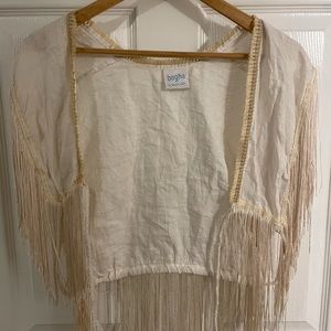 Wear as a layer or tie in the middle.